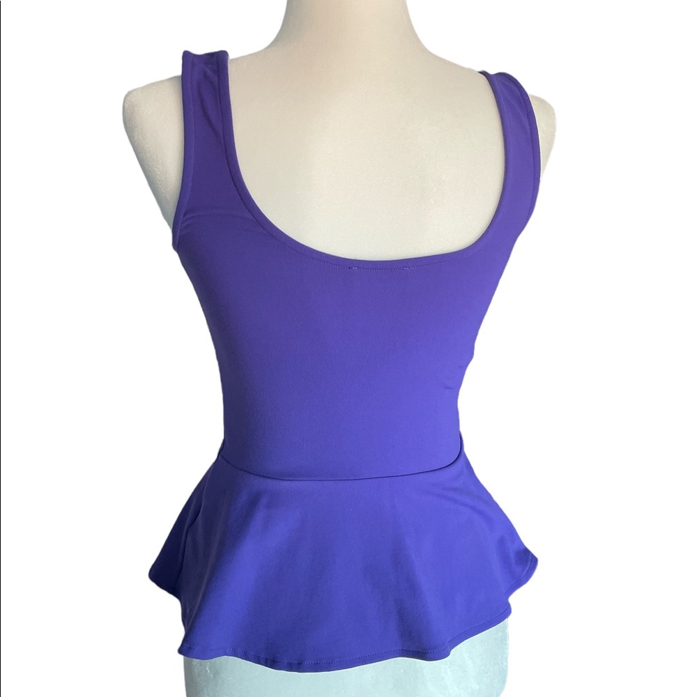 Bebe size small peplum scoop tank